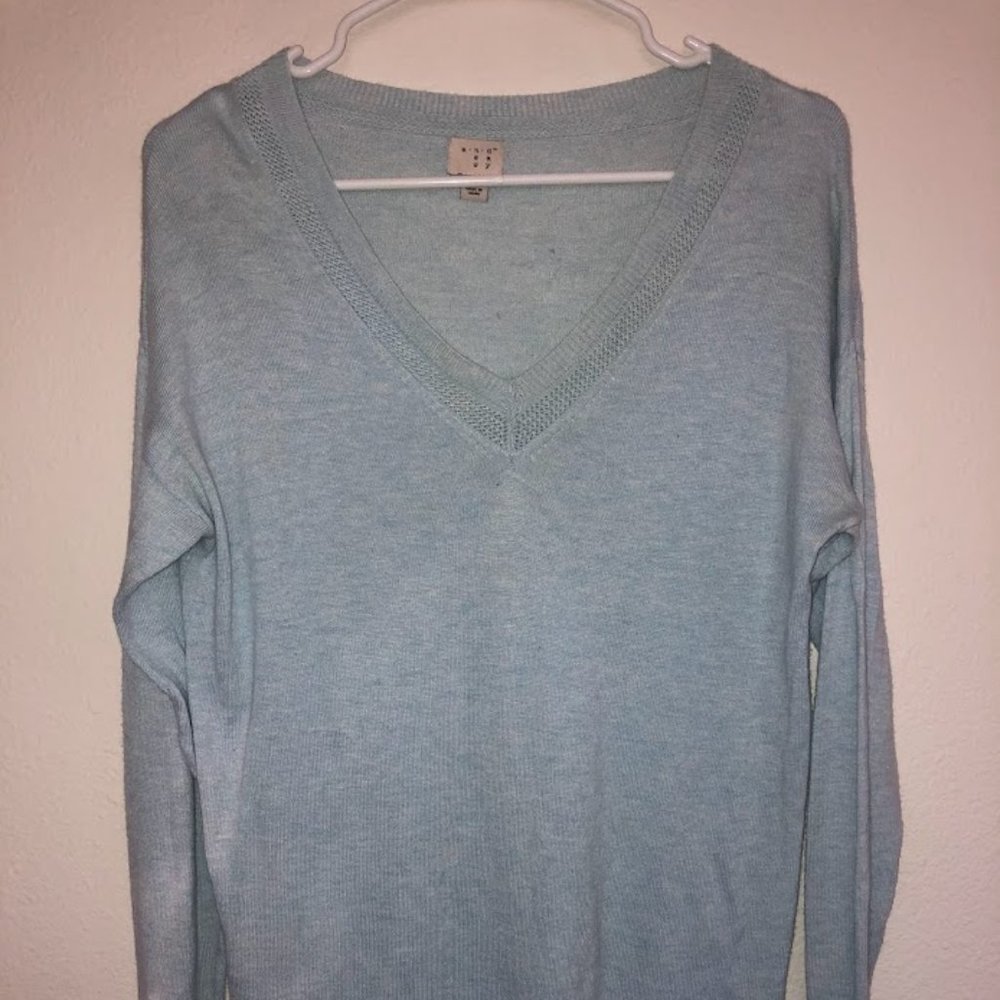 Light blue sweater